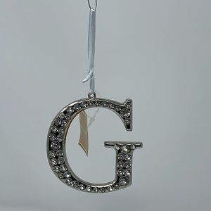 BNWT! Heavy metal “G” monogram ornament with rhinestone details.